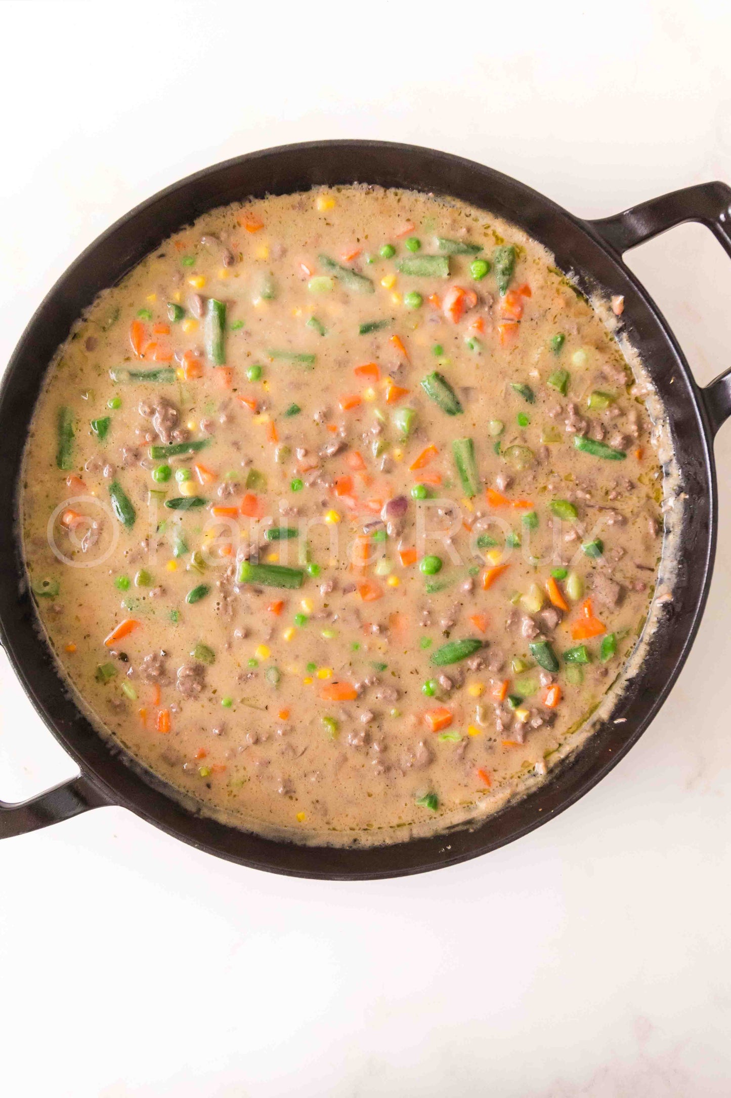 Ground beef pot pie with biscuits