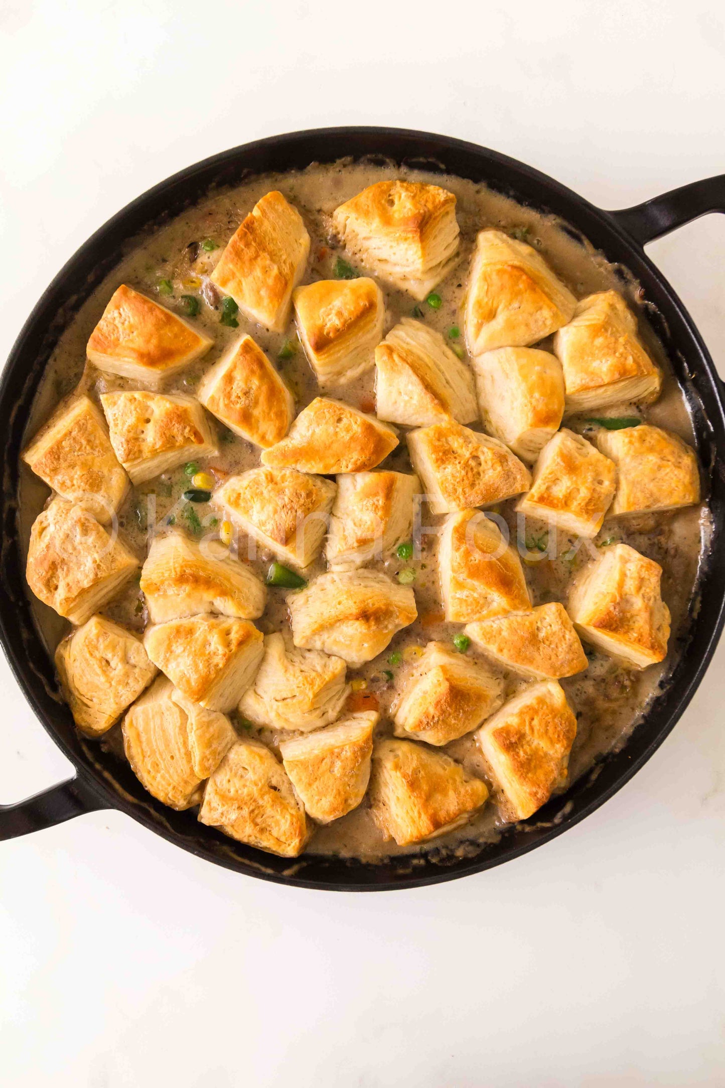 Ground beef pot pie with biscuits