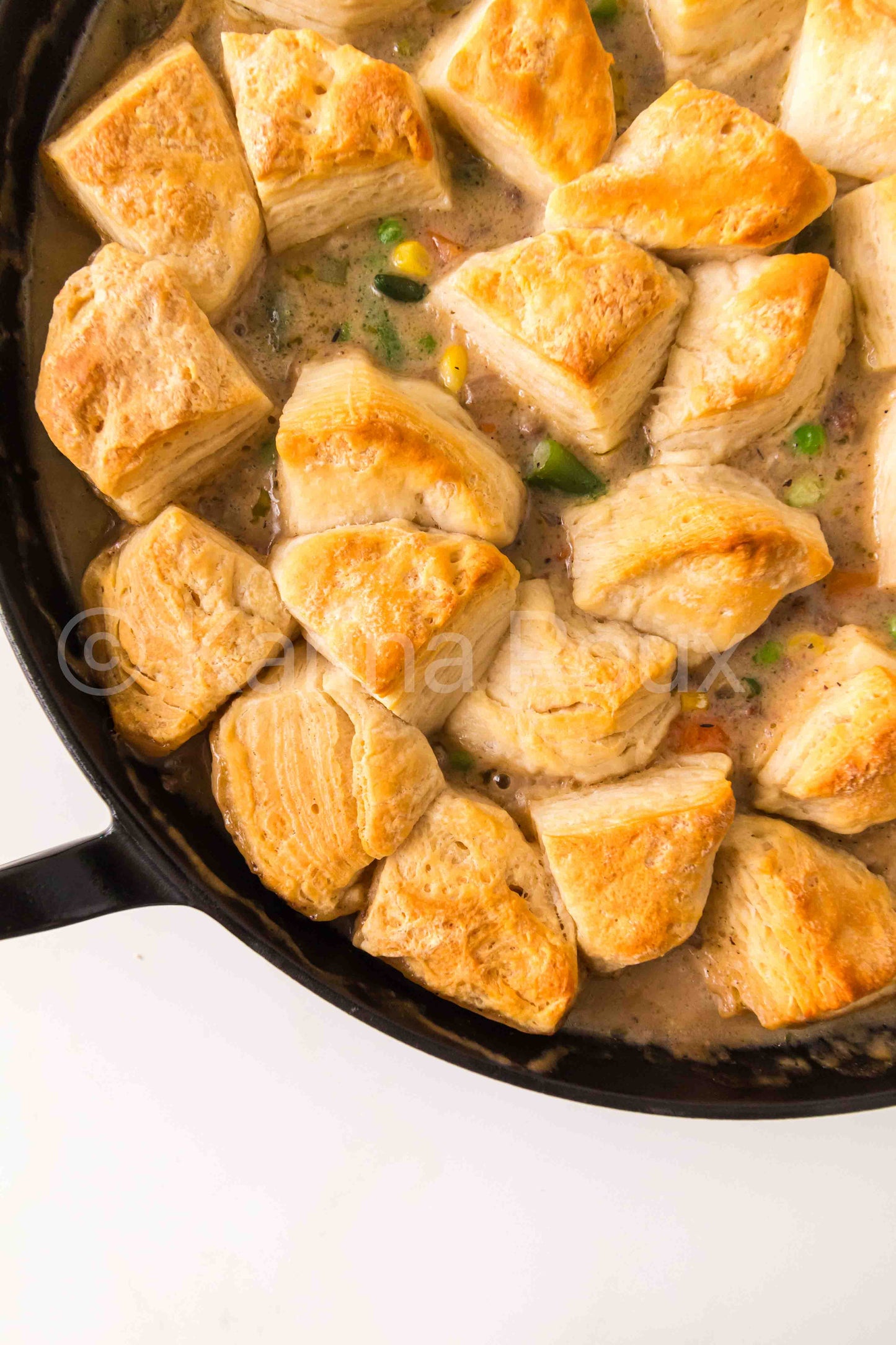 Ground beef pot pie with biscuits