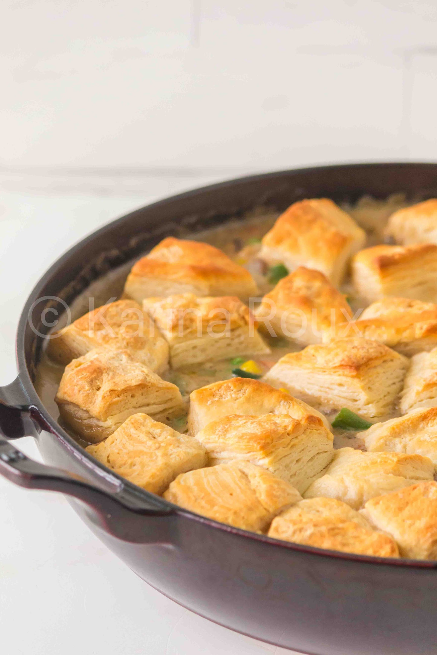 Ground beef pot pie with biscuits