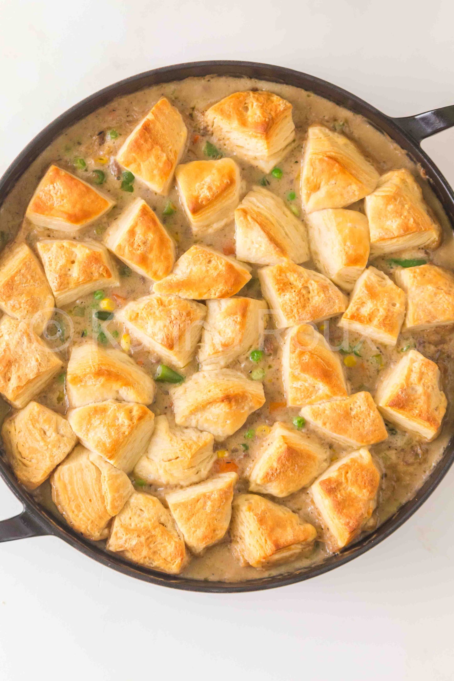 Ground beef pot pie with biscuits