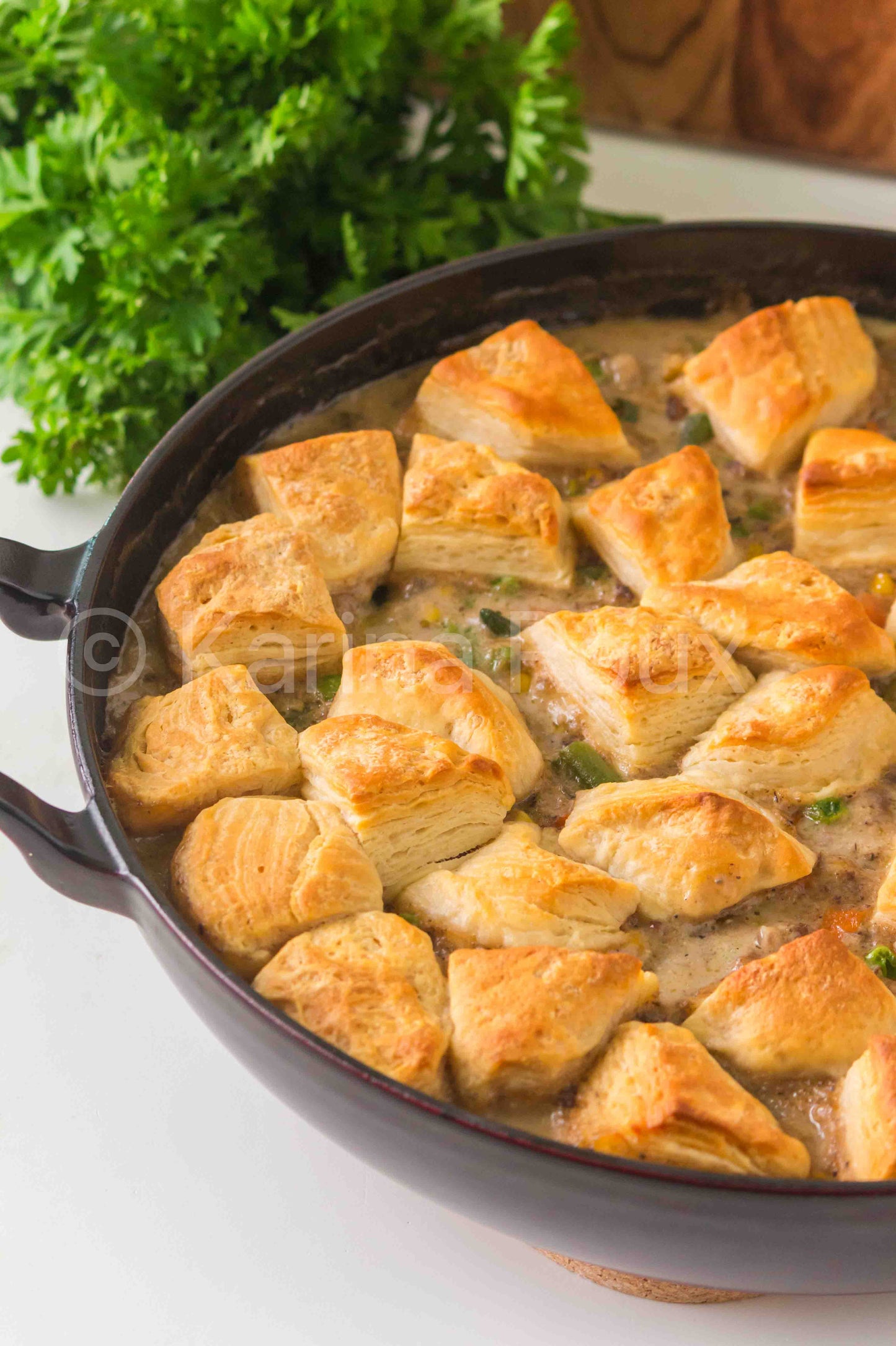 Ground beef pot pie with biscuits