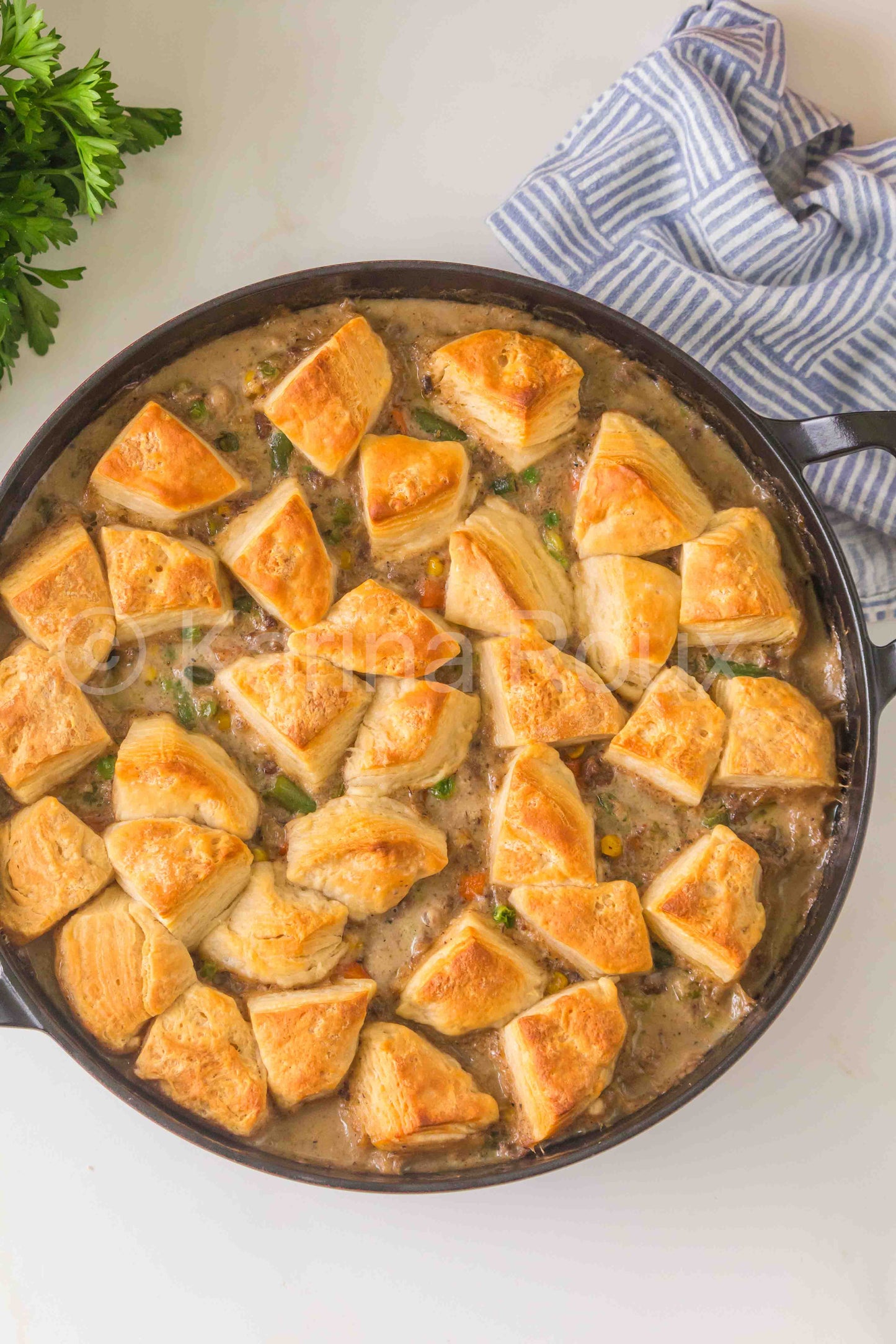 Ground beef pot pie with biscuits