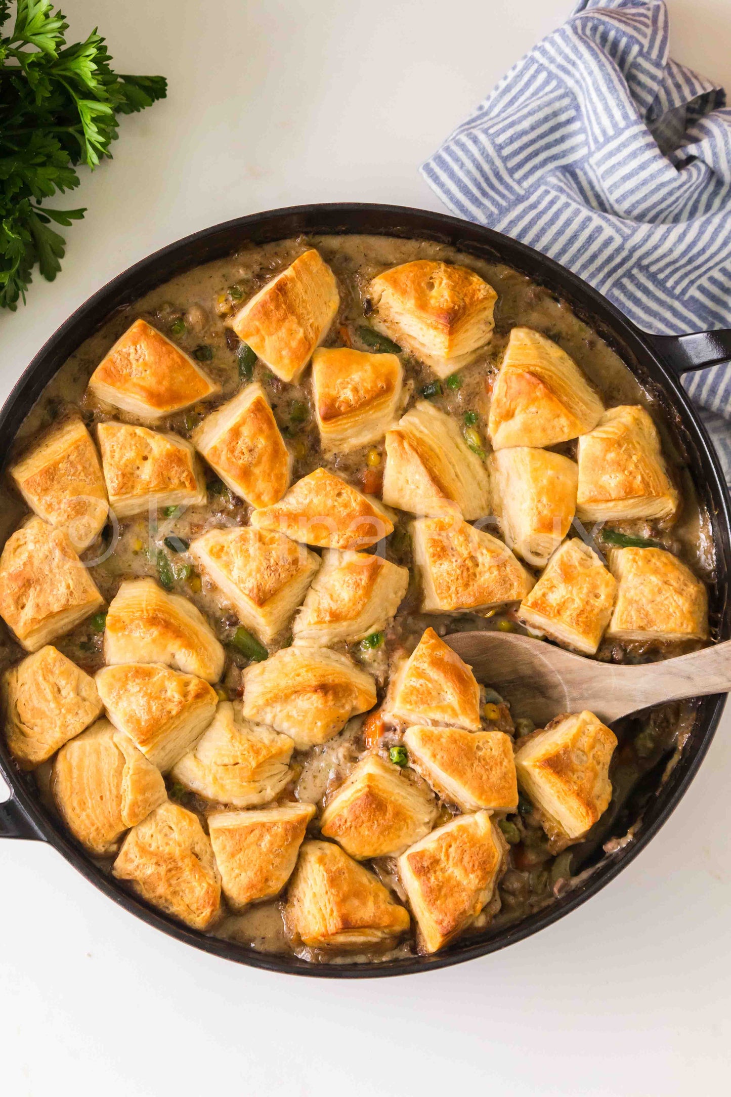 Ground beef pot pie with biscuits