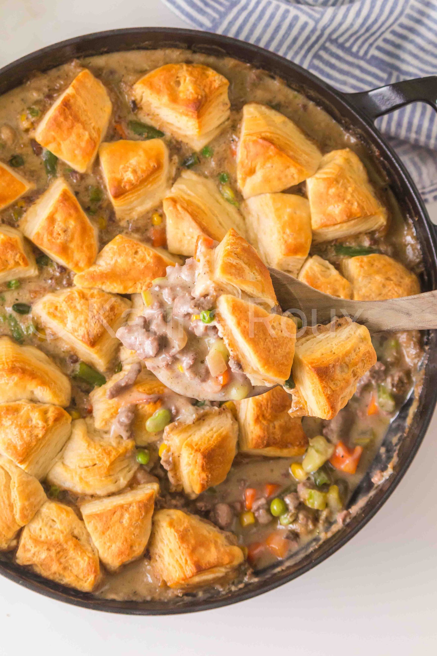 Ground beef pot pie with biscuits