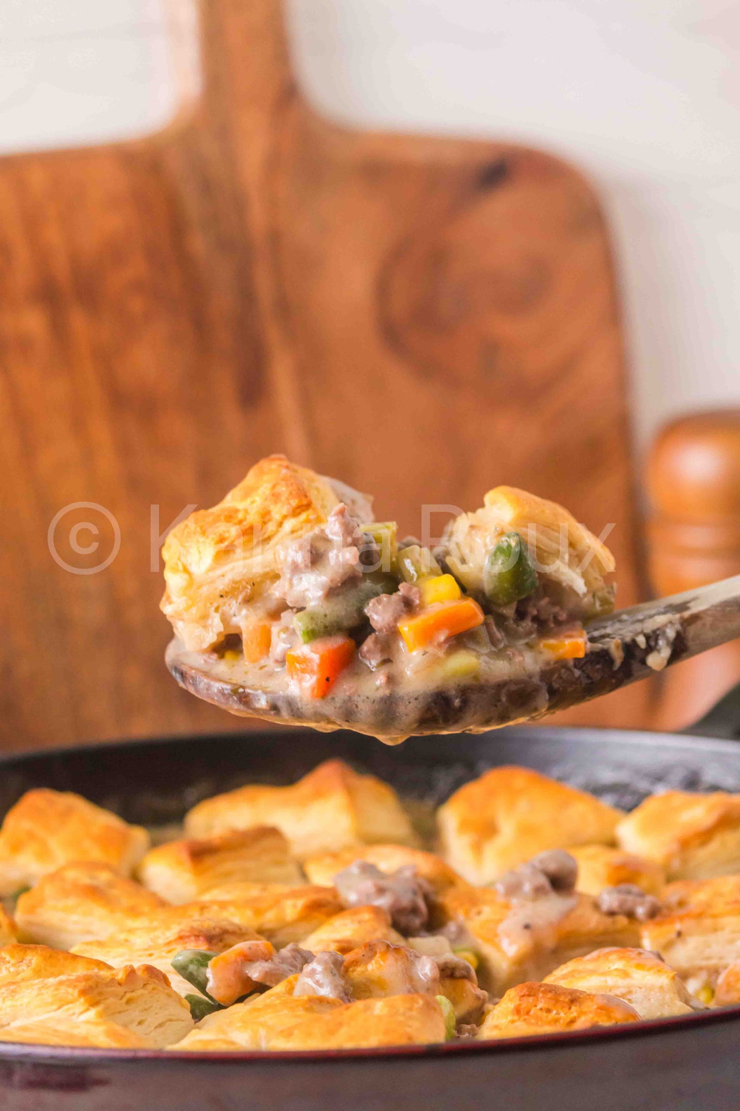 Ground beef pot pie with biscuits