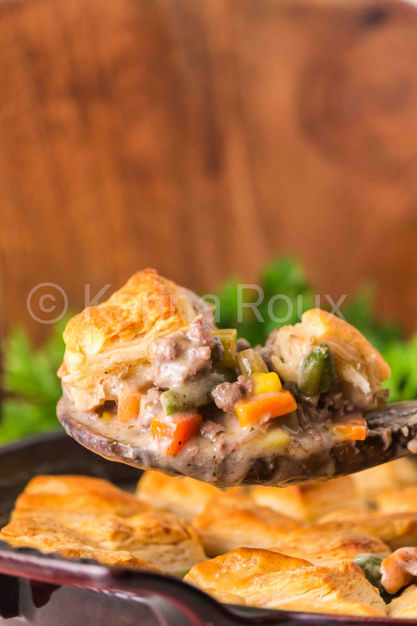 Ground beef pot pie with biscuits
