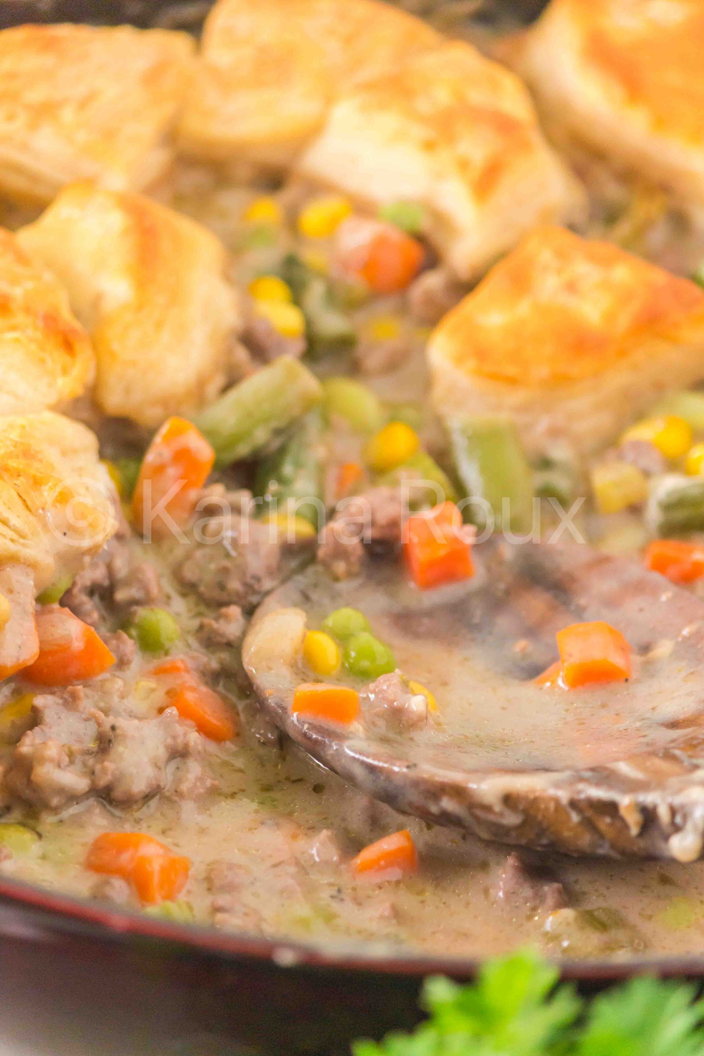 Ground beef pot pie with biscuits
