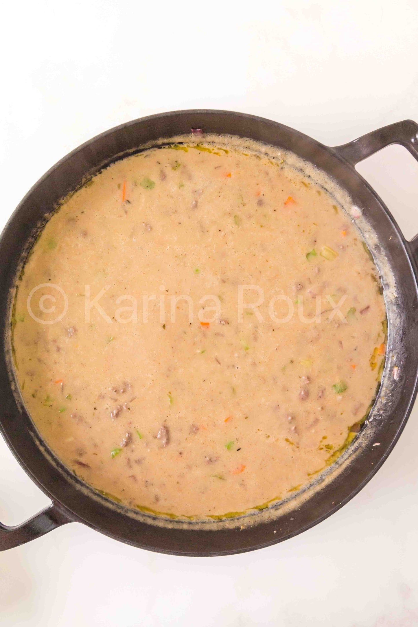 Ground beef pot pie with biscuits